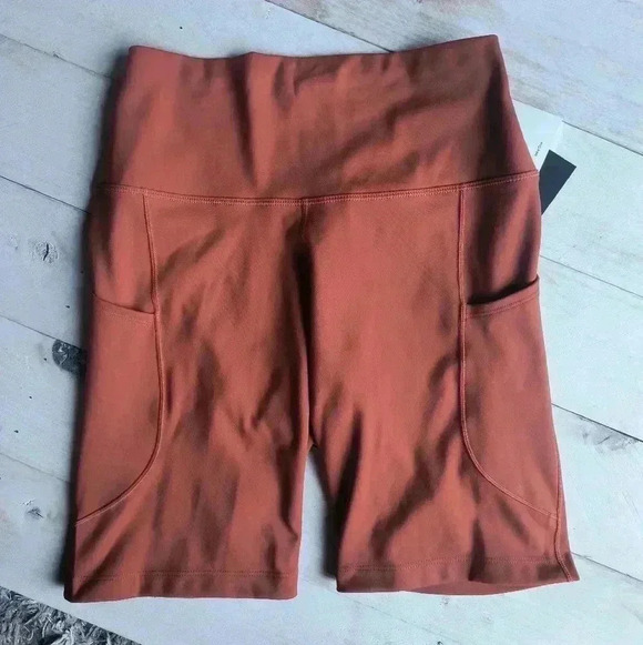 NWT Womens Nike One High Waisted 8" Biker Shorts With Pockets Burnt Sunrise - Picture 10 of 11